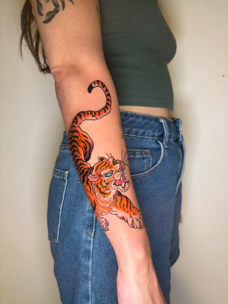 Neo-traditional tiger in colour on forearm
